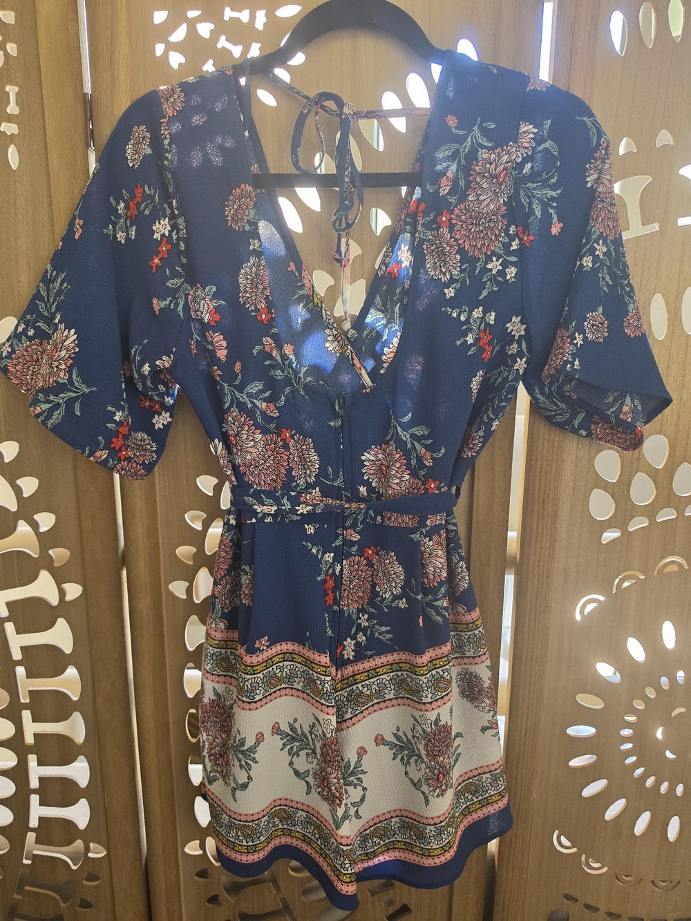 Francesca's Collections Navy Floral Romper with Pink & Green Accents